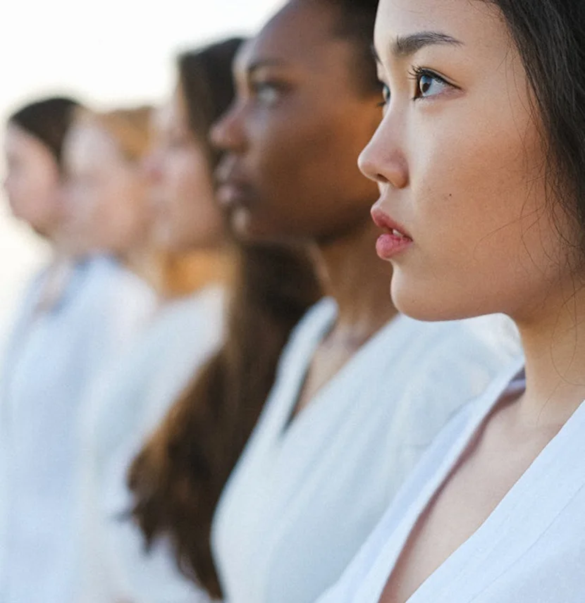 A diverse group of professional women in profile, symbolizing inclusive employment opportunities and workforce equality